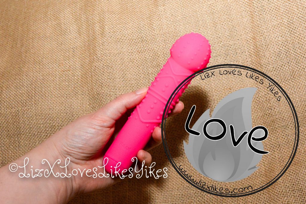 7 Speed Magic Wand Cactus - FAAK Review by LizX The magic wand in my hand with the stamp 'Love'