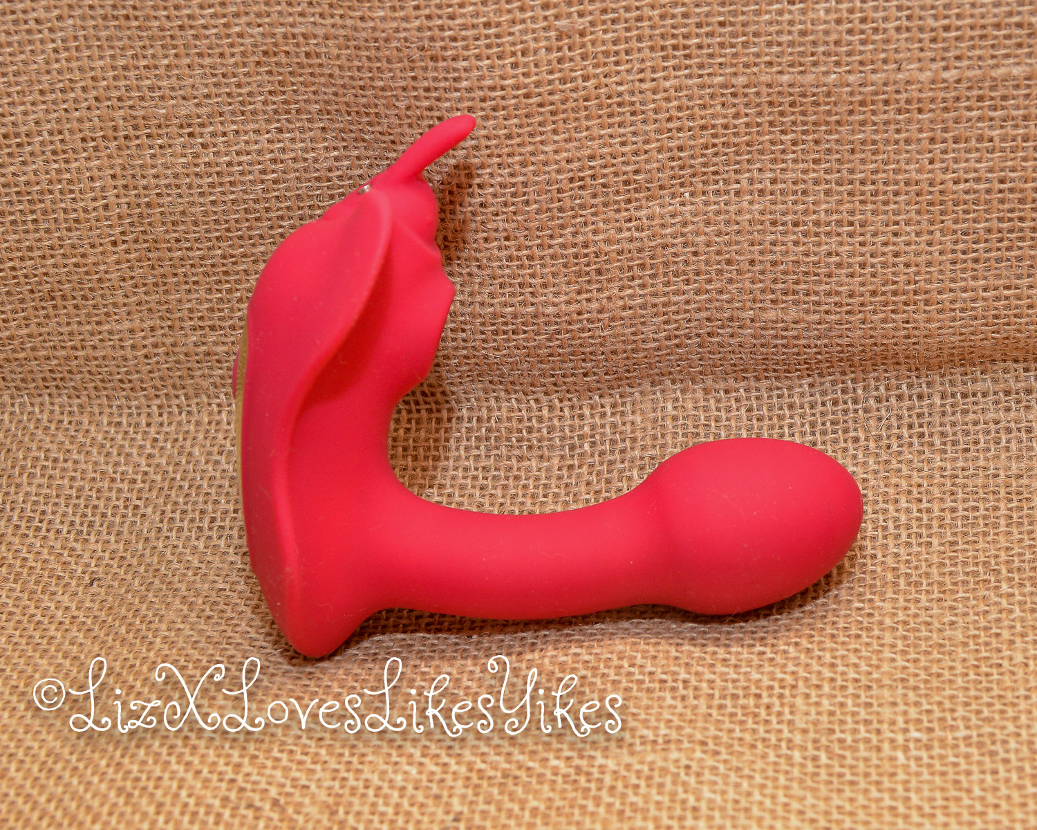 The toy from the side Review of Butterfly Desire Vibe Pro Bombex.com Copyright Liz BlackX