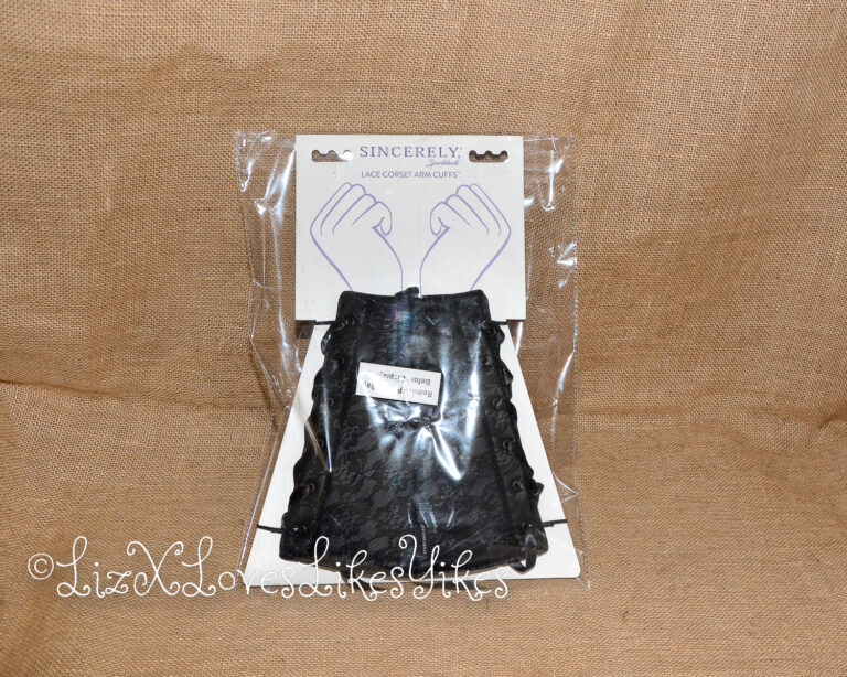 The cuffs in their package Review of Sincerely Sportsheets Lace Corset Arm Cuffs Copyright Liz BlackX