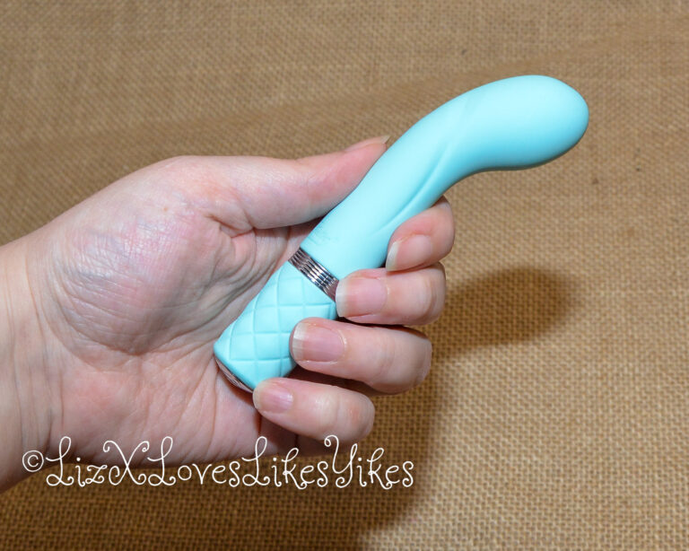 The vibrator in Liz's fingers Review of Pillow Talk Racy G-spot Vibrator - Teal Copyright Liz BlackX