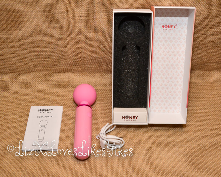 Review of the Pomi Wand Powerful Mini Vibrating Wand Massager Honey Play Box from Honeyplaybox.com Copyright Liz BlackX The box and its contents.