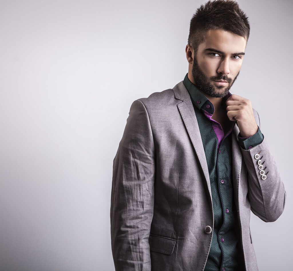 Picture from Depositphotos.com The man on the picture is not a male escort, he's a stock photo model for Depositphotos. https://depositphotos.com/photo/elegant-young-handsome-man-studio-fashion-portrait-32590287.html