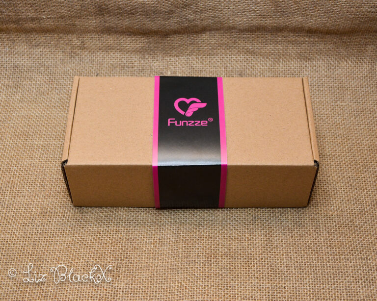 Unwrap the Night: Funzze Glow-in-the-Dark Glass Dildo Review Copyright Liz BlackX