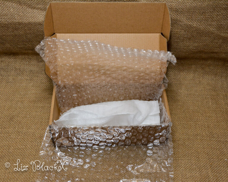 Unwrap the Night: Funzze Glow-in-the-Dark Glass Dildo Review Copyright Liz BlackX