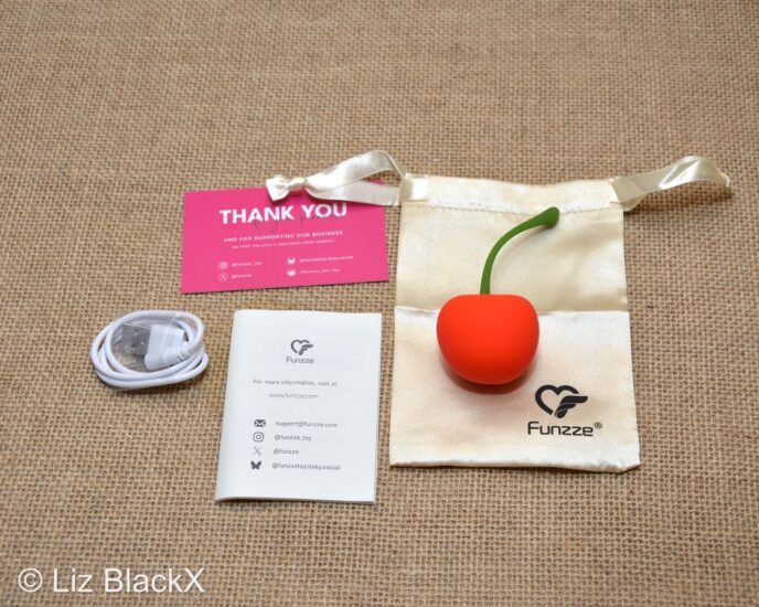 Funzze Cherry Vibrating Love Egg Review: Cute but Powerful? Copyright Liz BlackX